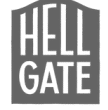 Gray logo with the words HELL GATE in bold white capital letters, stacked vertically within a rectangular shape with a slightly wavy top edge.